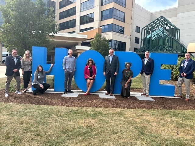 City Of Hope’s Industry Group Highlights Impact And Engagement With High Point Market Events. City of Hope's Zion, Illinois campus, pictured left to right: Cole Bawek, Ashley Furniture; Katie Doyle, City of Hope; Katie Easthon, City of Hope; Ryan Mahoney, Andmore; Angelina Fakhoury-Siverts, City of Hope; Will Harris, Darvin Furniture; Janita Pickett-Gordon, City of Hope; Tim Newlin, Norwalk Furniture and Pete Govorchin, City of Hope. 