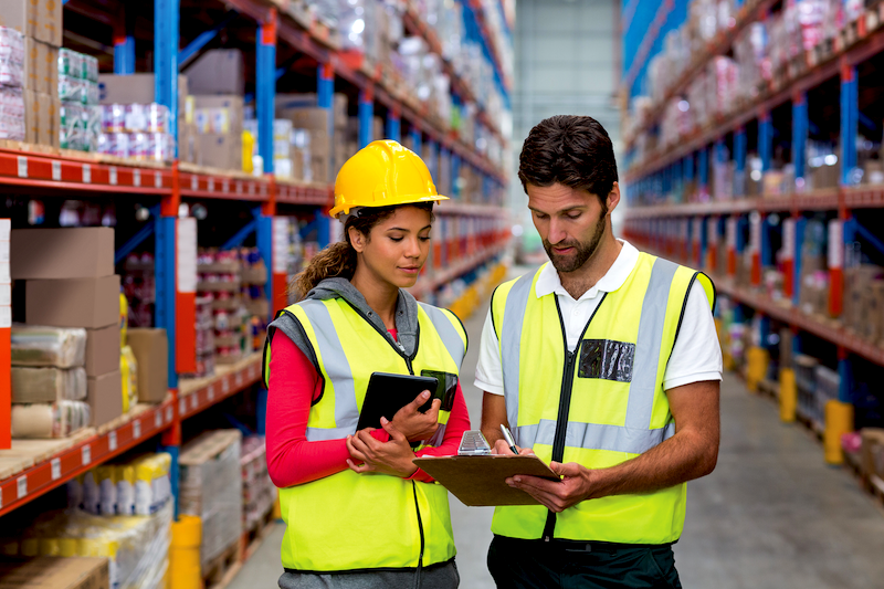 Key Strategies for Managers’ Success. Man and woman review stats. 