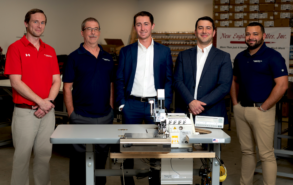 The New England Needles’ team includes (from left) Blake Becker, inside sales; Don Hadley, technician; Aaron August, president; Tony Giordano, vice president; and Lennix Rosa, technician.