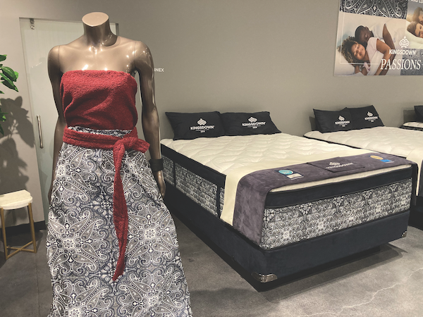 Kingsdown Design Mavericks. A man’s pocket square influenced the design of the border fabric for the Passions collection, also shown on the mannequin’s skirt.